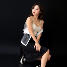 A beautiful Korean woman wearing a sleeveless tank top layered with a transparent white jacket, a short black skirt, and sneakers