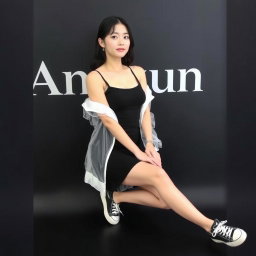 A beautiful Korean woman wearing a sleeveless tank top layered with a transparent white jacket, a short black skirt, and sneakers