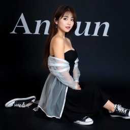 A beautiful Korean woman wearing a black strapless dress layered with a sheer white jacket, dressed in a short black skirt and sneakers
