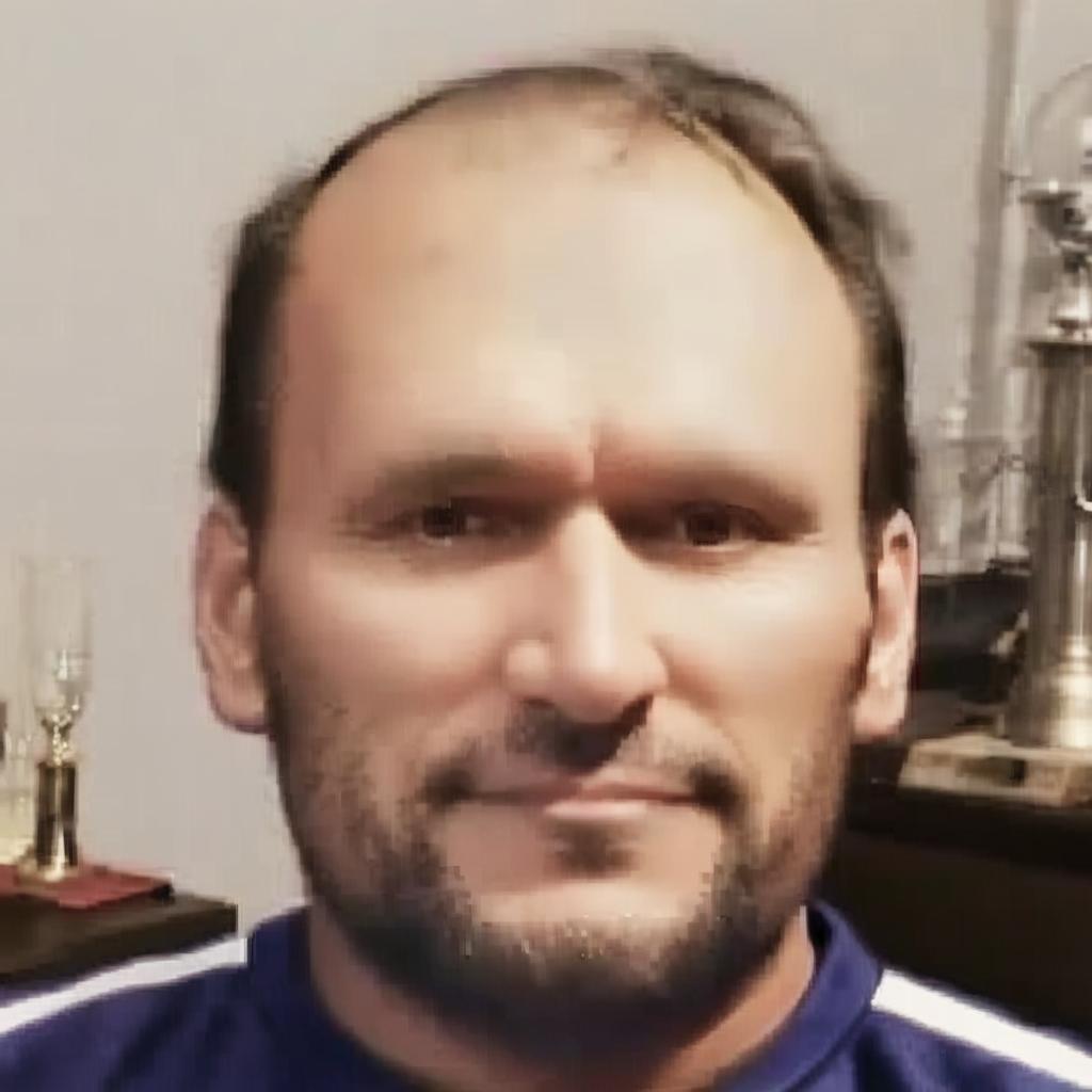 Take this face and create an image with a football jersey