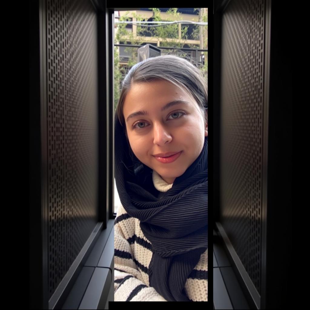 A cozy cafe scene with soft natural lighting, featuring a young woman wearing a black scarf and a striped sweater