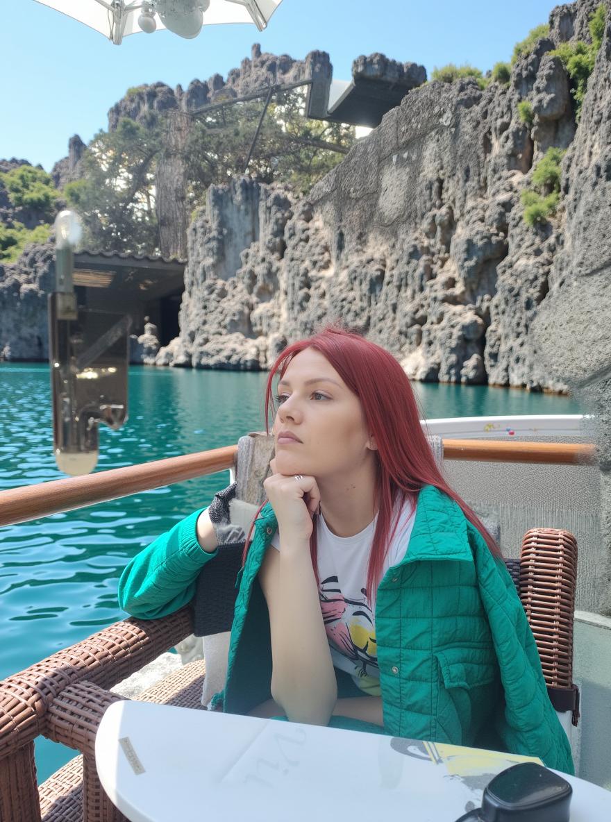 A serene and picturesque scene of a woman with vibrant red hair, sitting at a cute table floating on the sea, sipping coffee