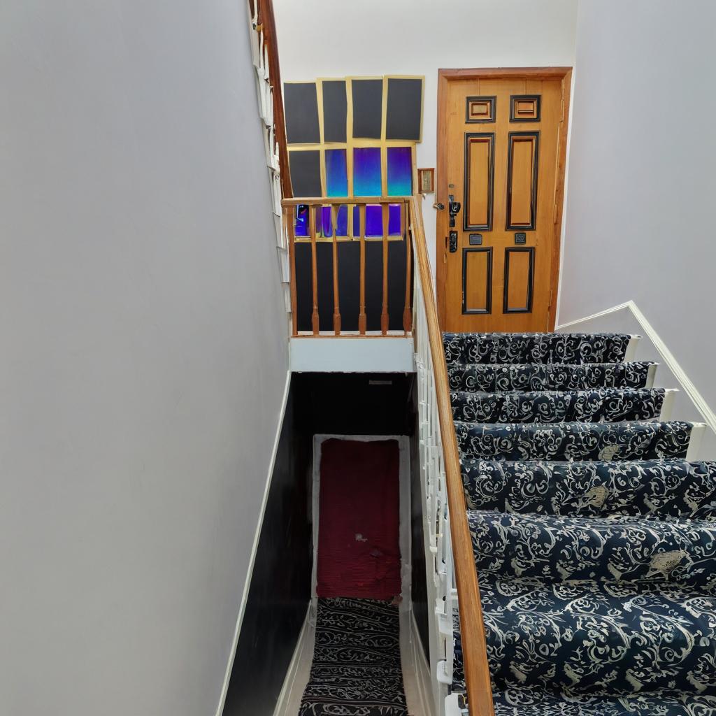 The walls in the staircase should all be black.