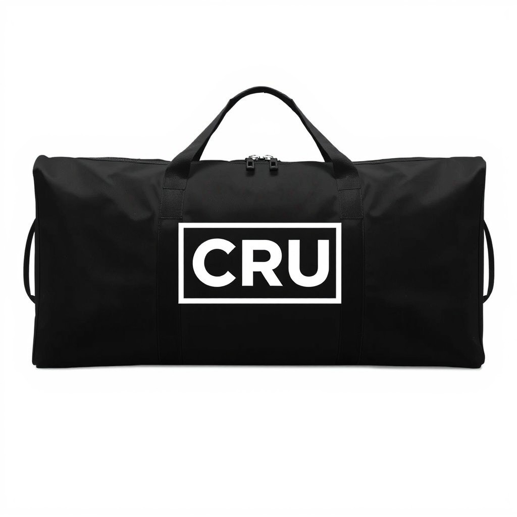 A large, elongated black travel bag featuring a prominently displayed white logo that reads 'CRÜ' in the center