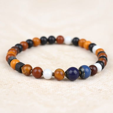 A beautifully crafted bracelet featuring a combination of 8mm beads made from tiger's eye, hematite, carnelian, white quartz, and black obsidian, perfectly alternating in a vibrant pattern