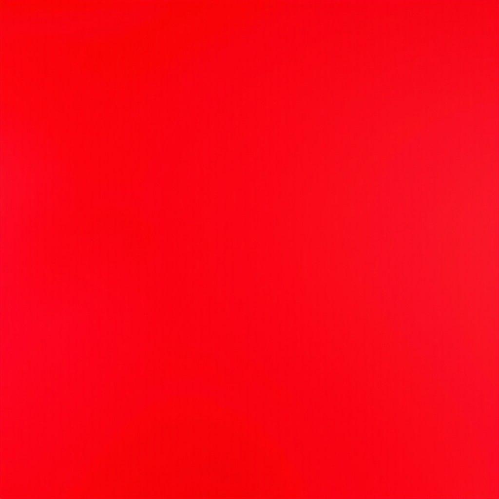 A vibrant red image, showcasing a uniform and rich texture of red hues