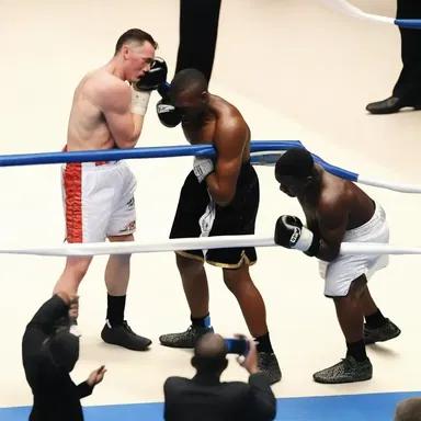 Within the context of the religious ceremony, the referee declared a technical knockout when one boxer was unable to continue due to exhaustion.