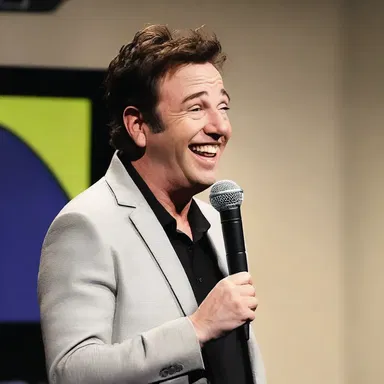 The comedian delivered the punchline and smirked, knowing he had the audience laughing.