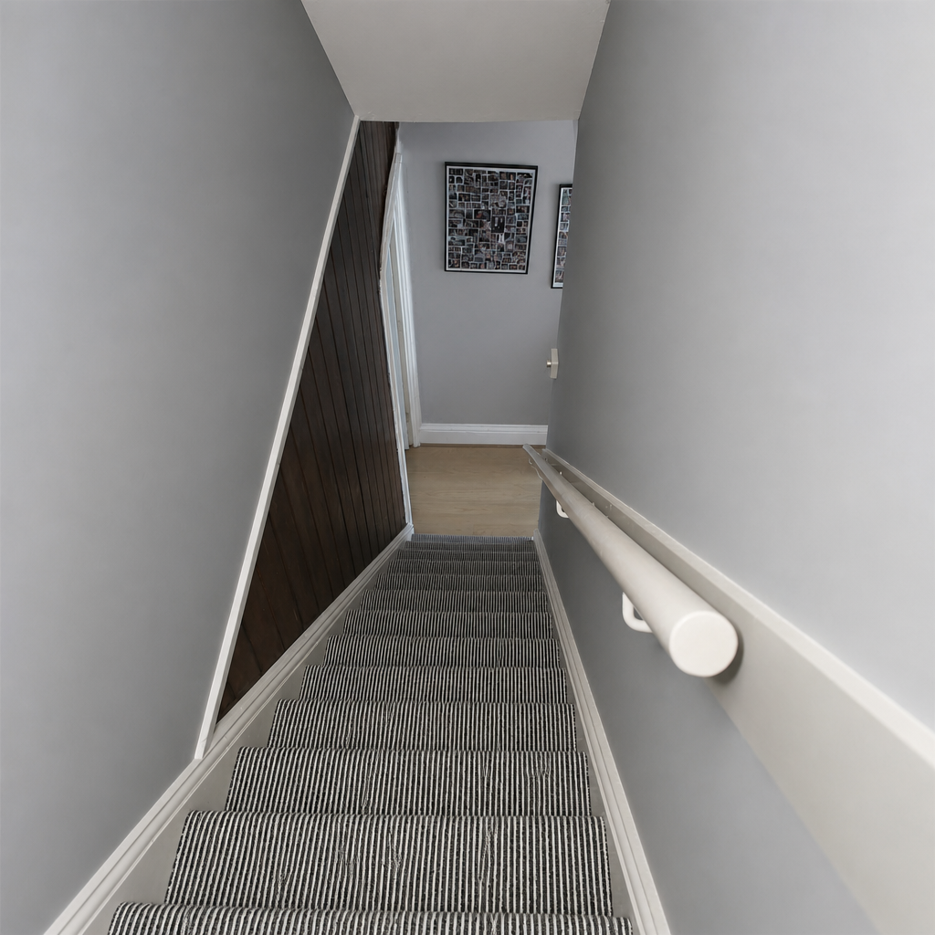 Change the walls and ceiling color to pale grey, change the carpet to thin black and white stripes.