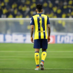 Back view of a player named 'ÇELEN' taking his first step on the pitch at Fenerbahçe Ülker Stadium, donned in a yellow and navy blue striped jersey with number '68', showcasing a swallow tattoo on his arm.