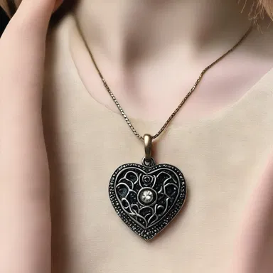As a romantic gesture, he gifted her a beautiful necklace with a ferric pendant, symbolizing the strength of their love.