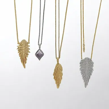 The fashion designer incorporated talon-shaped pendants into their latest jewelry collection.