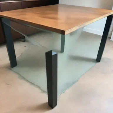 The uneven flooring caused the glass of water on the table to tump over, highlighting the need for better structural design.