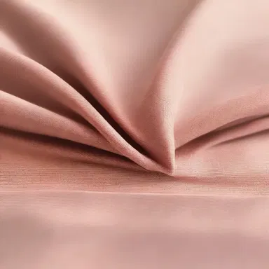 The basal layer of a fabric provides the necessary support for the overall structure of a garment.